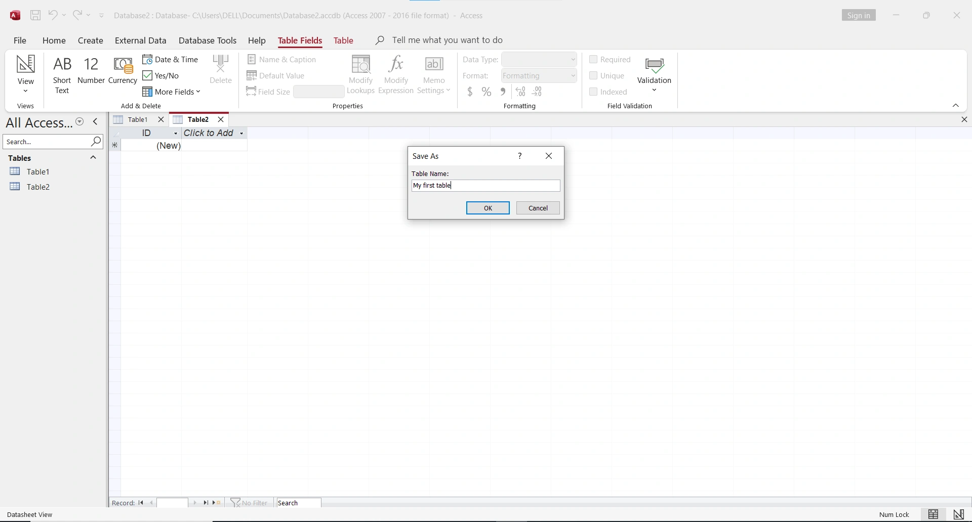Vista de diseño de tabla en Access con definición de campos, tipos de datos y diálogo para guardar la tabla con nombre personalizado