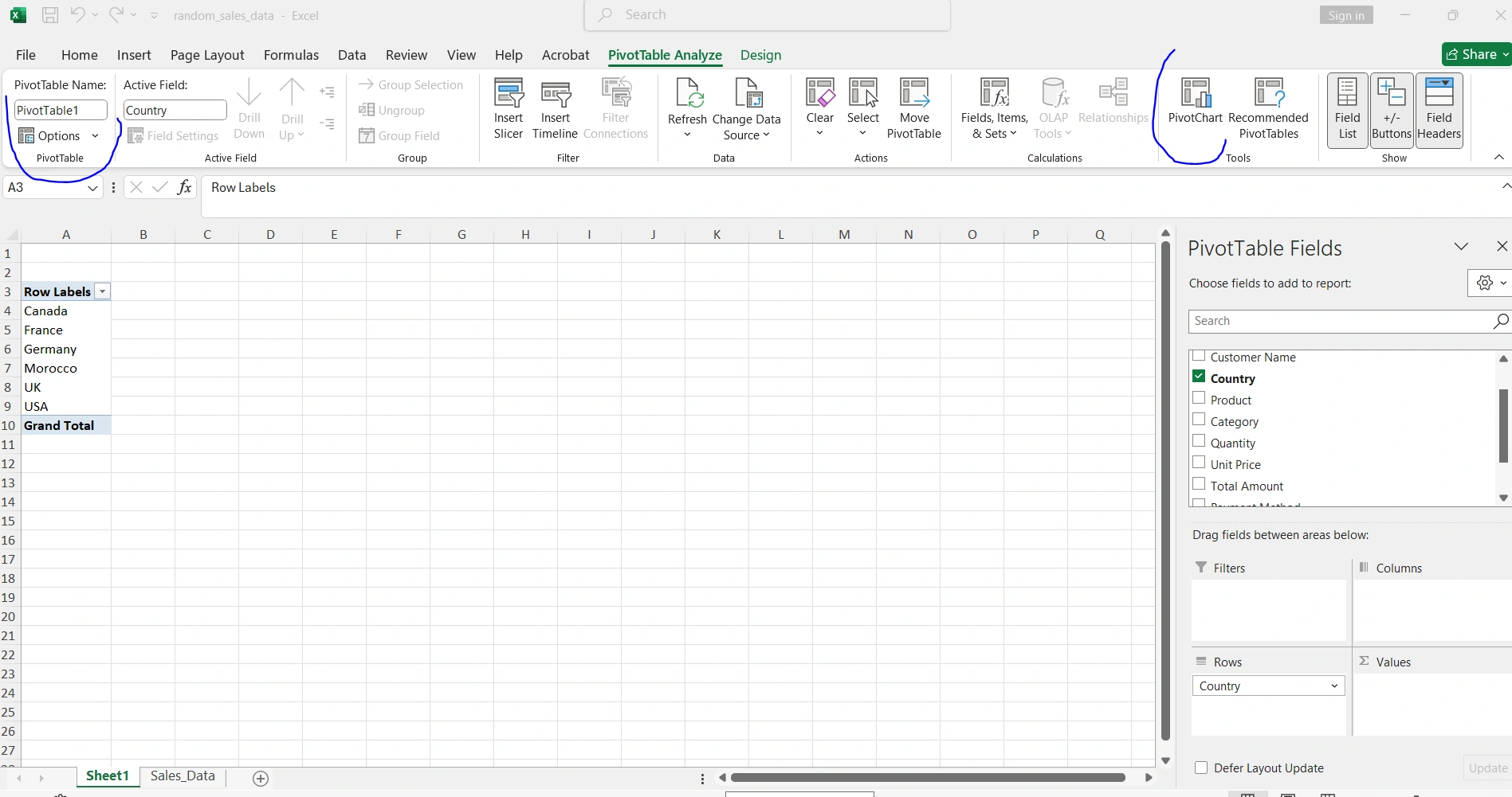 Tabla dinámica en Excel mostrando análisis de ventas por región con países y totales